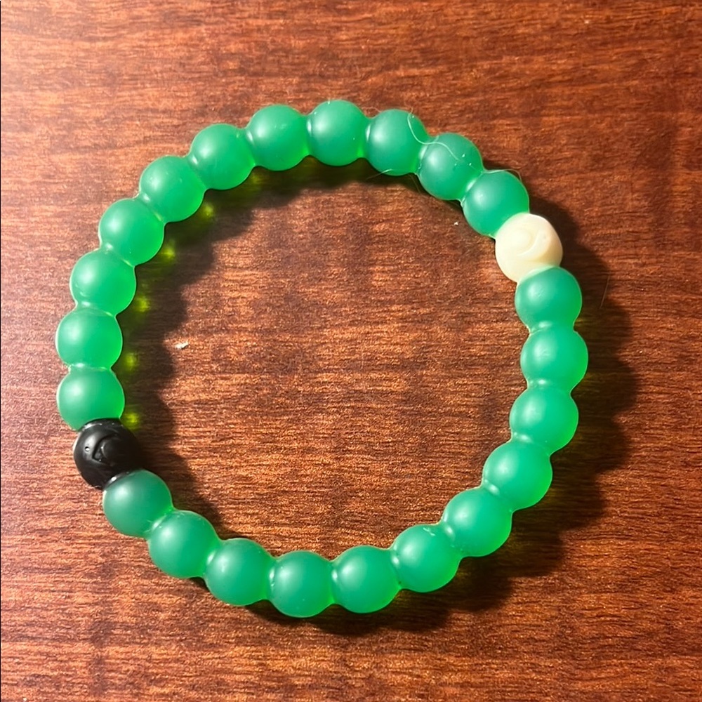 Lokai Green and Black Beaded Bracelet Circular Design